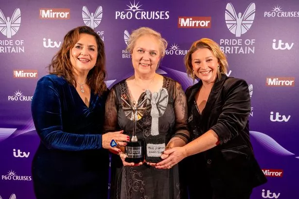 ITV Fundraiser winner Joanne Harris is presented her award by Ruth Jones and Joanna Page.