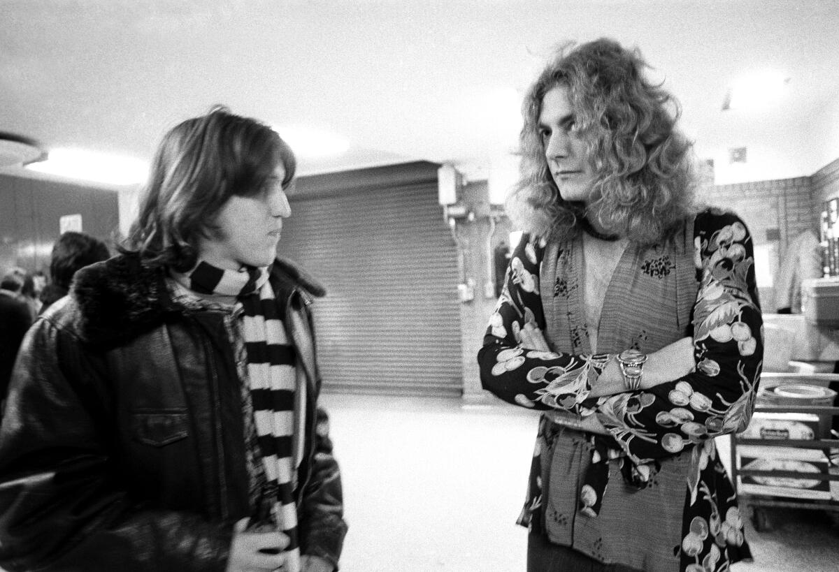 Cameron Crowe, left, and Led Zeppelin’s Robert Plant backstage at Chicago Stadium in January 1975.