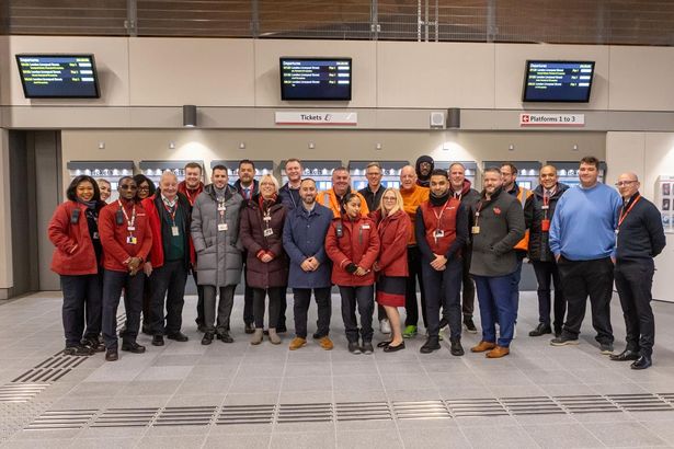 Rail and council chiefs at new station
