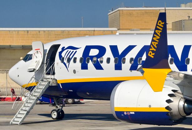 Luqa, Malta - 7 August 2023: Boeing 737 holiday jet operated by Irish airline Ryanair with door open and retractable passenger steps lowered