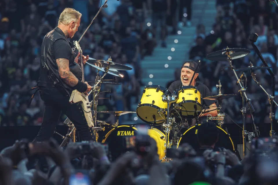 James Hetfield and Lars Ulrich of Metallica perform on stage.