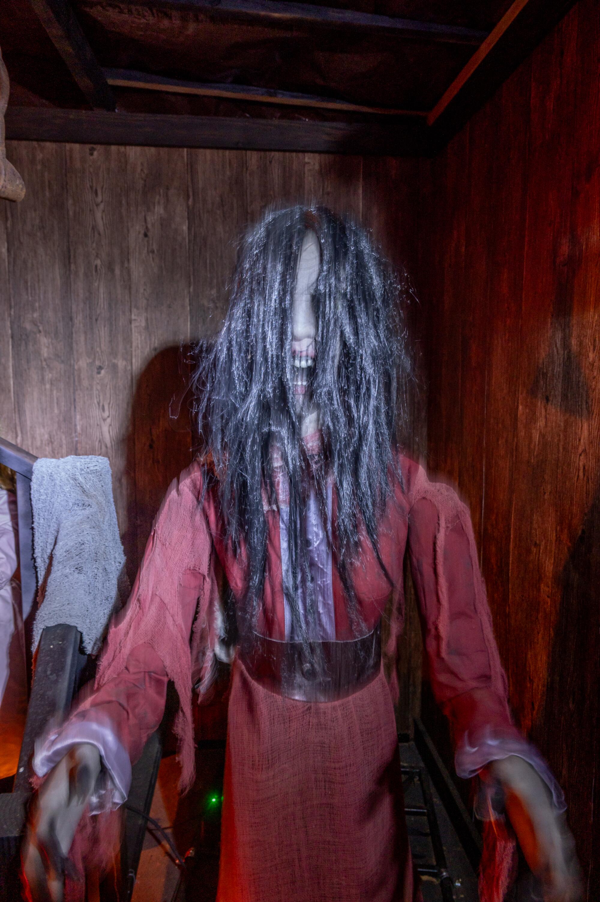 A creepy woman figure at the Hatteras Halloween House.