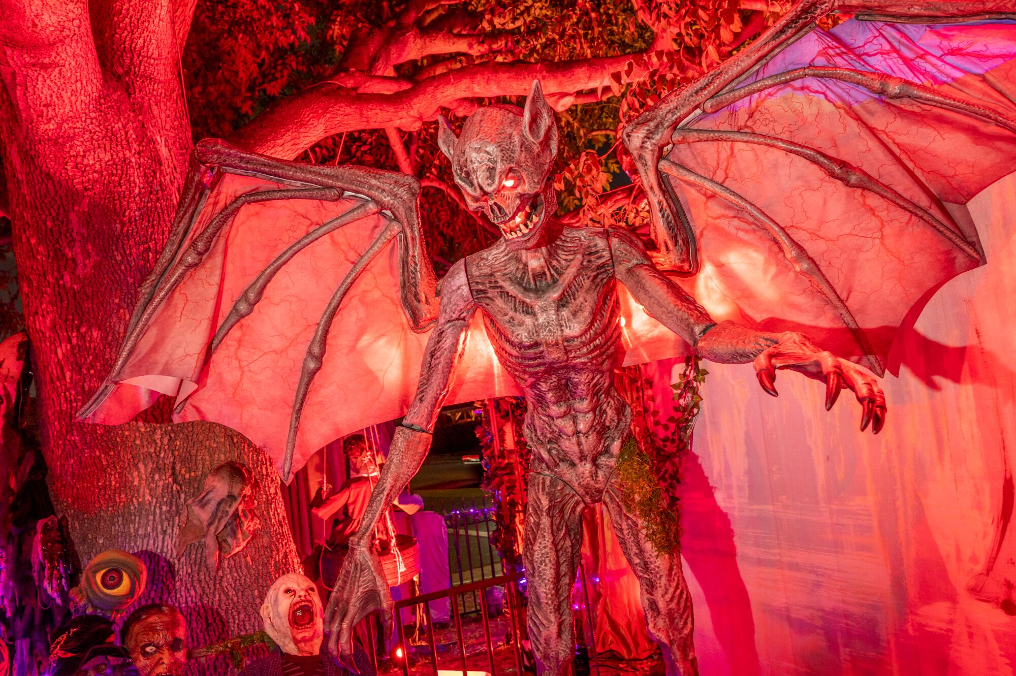 A winged demon figure.