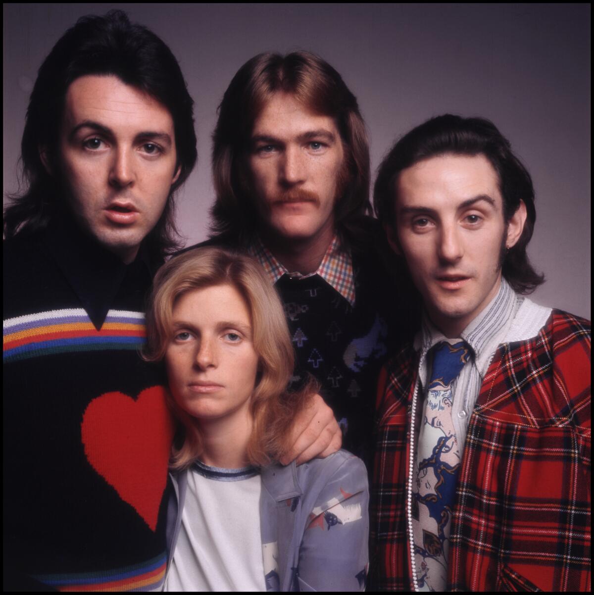 Paul McCartney, Linda McCartney, Denny Seiwell and Denny Laine. Promotional photo shoot for "Wild Life," 1971.