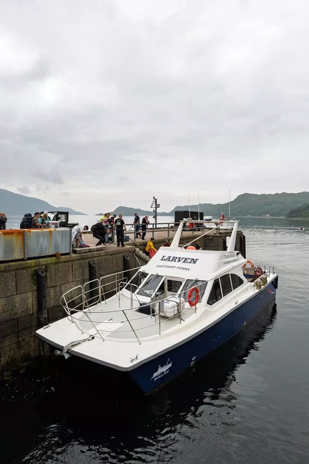 Inverie, Scotland Jul 24 2025 The Knoydart ferry at Inverie pier, where passengers board for the scenic return journey to Mallaig, surrounded by the dramatic Scottish Highlands.