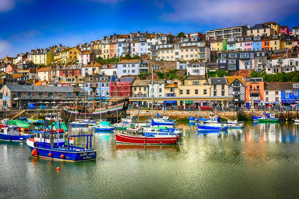 Colorful hillside homes overlooking the harbor at Brixham