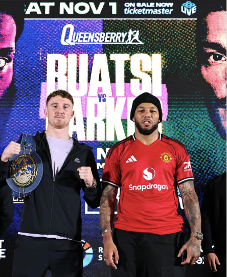 Two male boxers, Buatsi and Parker, at a press conference with a promotional banner behind them.
