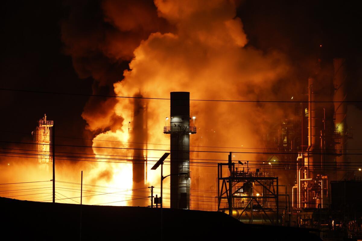 A fire breaks out at Chevron's refinery on Thursday in El Segundo.
