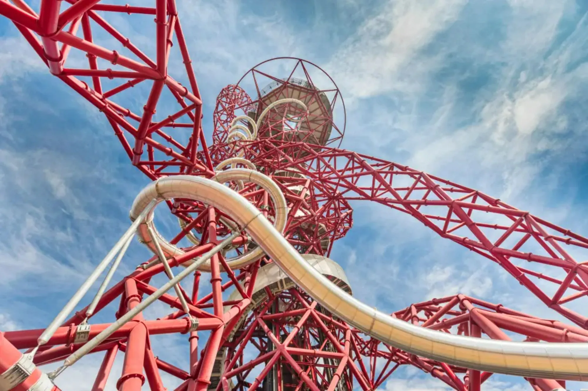 An image collage containing 1 images, Image 1 shows ArcelorMittal Orbit tower and slide in Queen Elizabeth Olympic Park