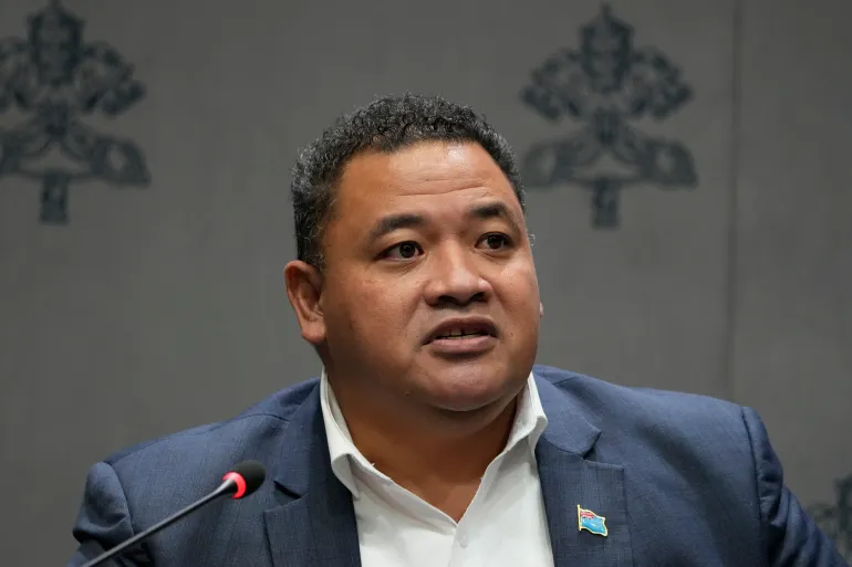Tuvalu's Minister for Home Affairs, Climate Change, and Environment Maina Talia attends a press conference at the Vatican, Tuesday, Sept. 30, 2025, to present the "Raising Hope for Climate Justice Conference," promoted by the Laudato Si' (Praise Be to You) Movement, which was inspired by the late Pope Francis' encyclical letter of the same name. (AP Photo/Gregorio Borgia)