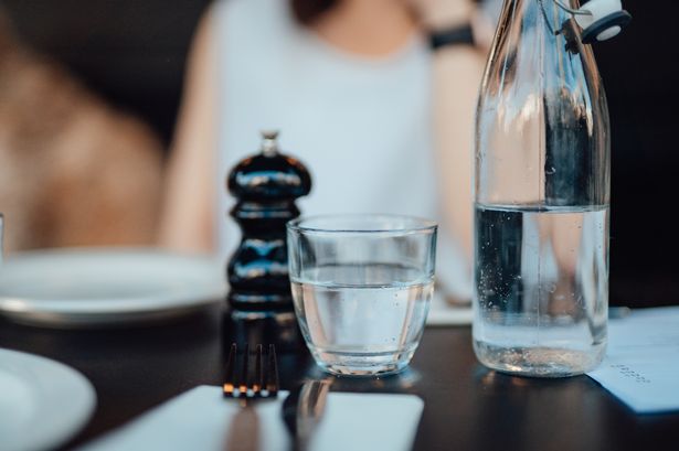 A glass of water in a restaurant