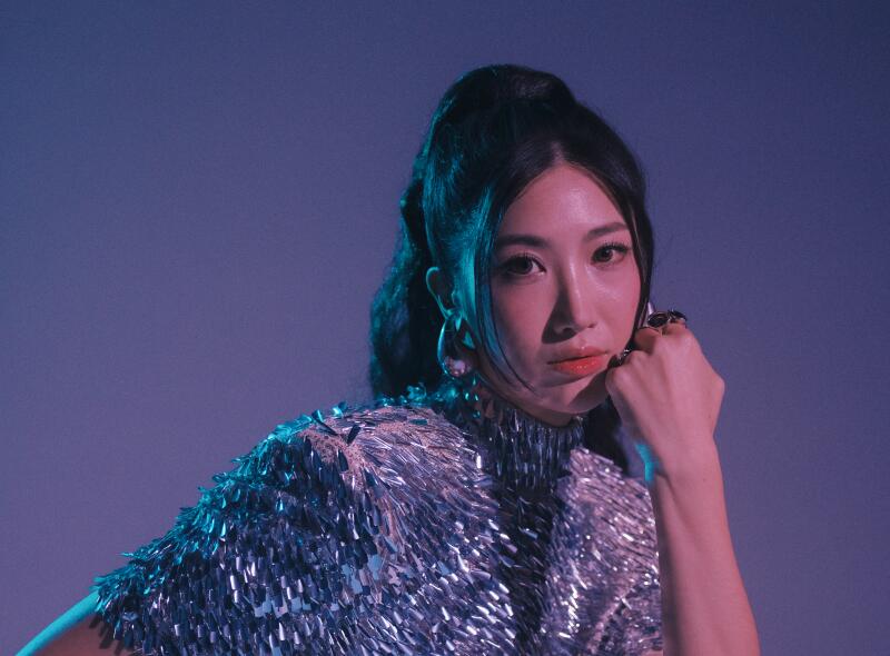 EJAE is the singing voice for Rumi- 