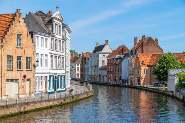 This is a photo of architecture and Langerei canal in Bruges, Belgium