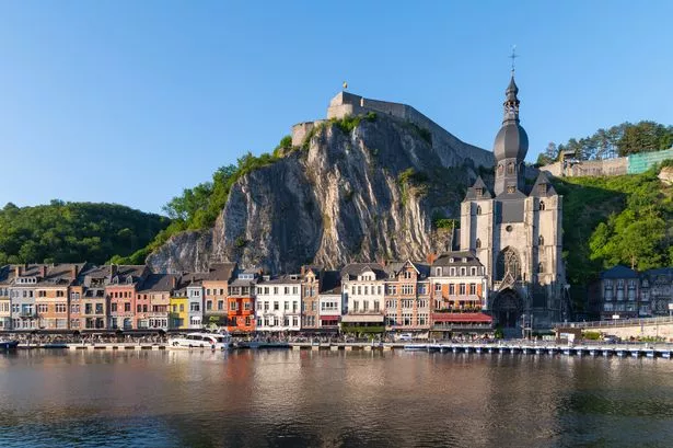 This is a photo of Dinant, Belgium and the river Meuse
