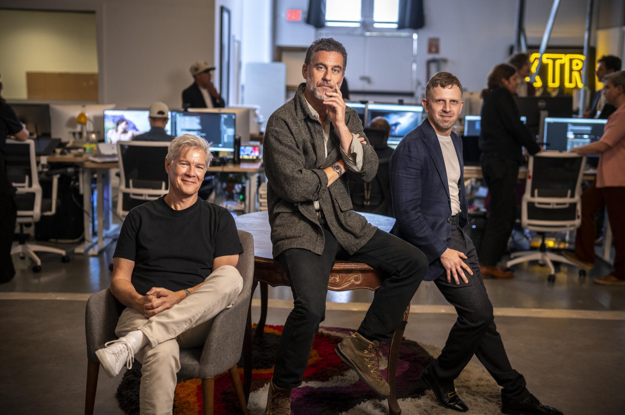 Three tech entrepreneurs sit for the camera.