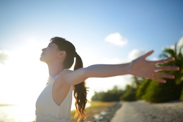 Woman arms out stretched