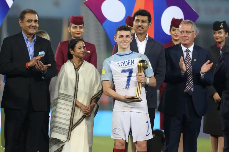 England's Philip Foden poses with the Golden Ball award during the presentation ceremony for FIFA U-17 World Cup in Kolkata, India, Saturday, Oct. 28, 2017. (AP Photo/Anupam Nath)