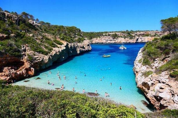 View of Calo d'es Moro, a paradisiacal cove of turquoise waters and wild cliffs on Mallorca's southern coast. Mallorca. Balearic islands. Spain